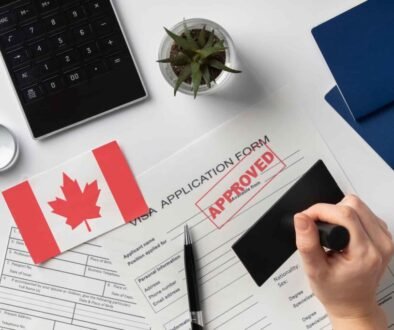 visa-application-composition-with-canadian-flag (1)